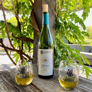 Bottle of white wine and two wine glasses