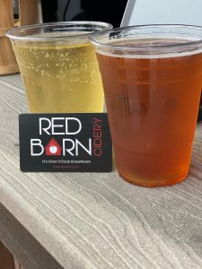 Cups of cider and business card from Red Barn Cidery in Rockland, NY
