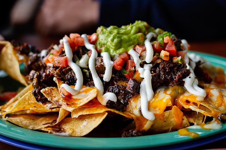 Plate of loaded nachos