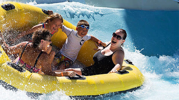 Family on a tube at Zoom Flume Waterpark