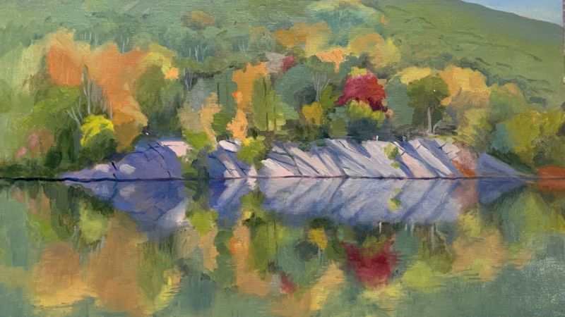 The attached image shows artwork by Jeanne Plekon depicting Hessian Lake at Bear Mountain State Park.