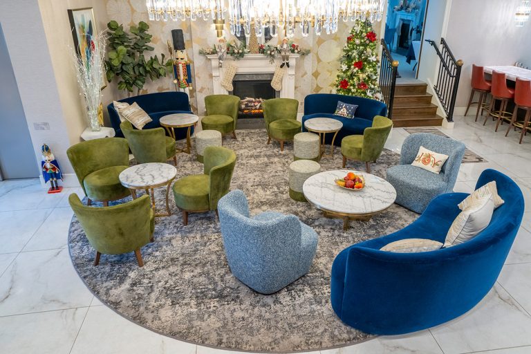 Chairs and tables in Orange Inn Boutique lobby