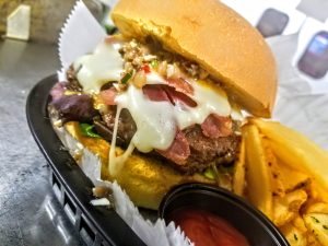Cheeseburger and fries plate from Illusive Cafe, Rensselaer