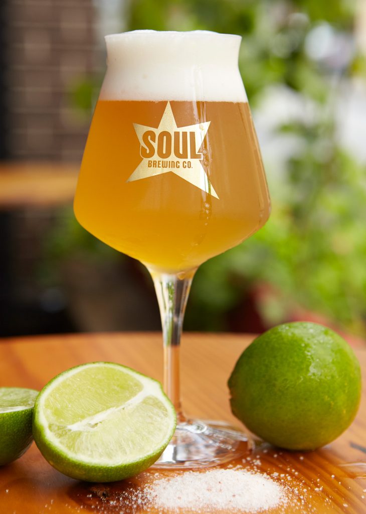 Glass of beer and limes from Soul Brewing Company, Westchester