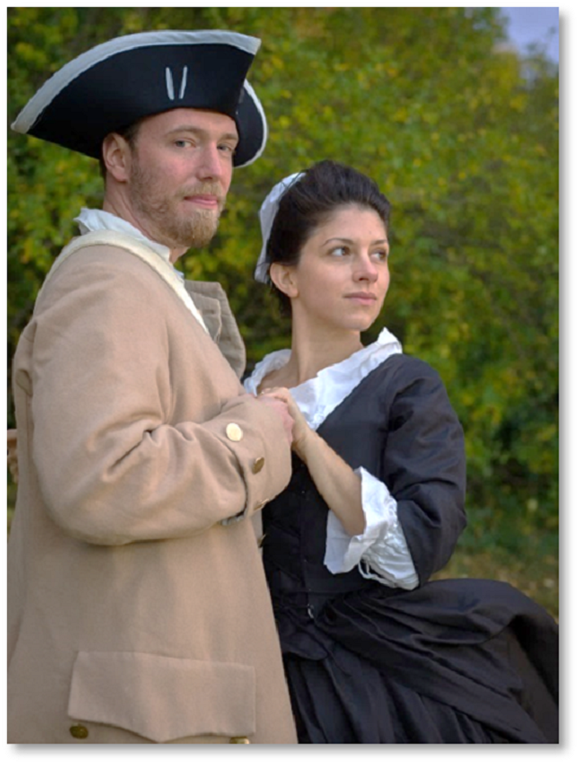 A man and a woman in Colonial-era clothing hold hands during the Ghost Tour at Clermont State Historic Site in Germantown.