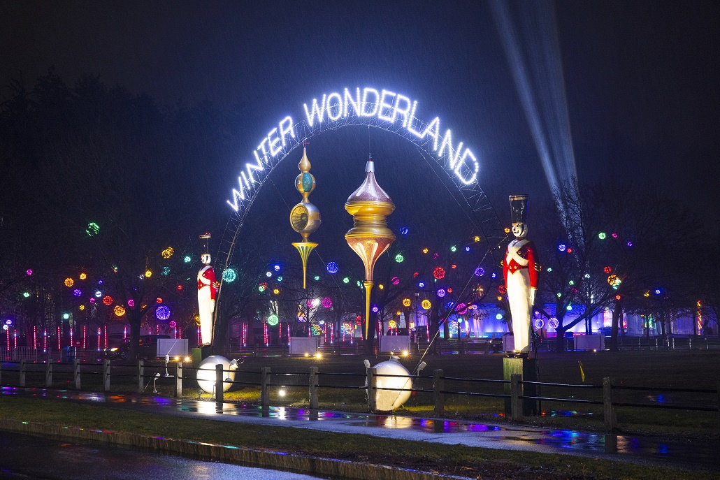 The lit up sign for Winter Wonderland with toy soldiers and giant ornaments.