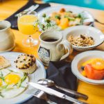 Breakfast-by-Albergo-orange-juice-and-mug-on-table