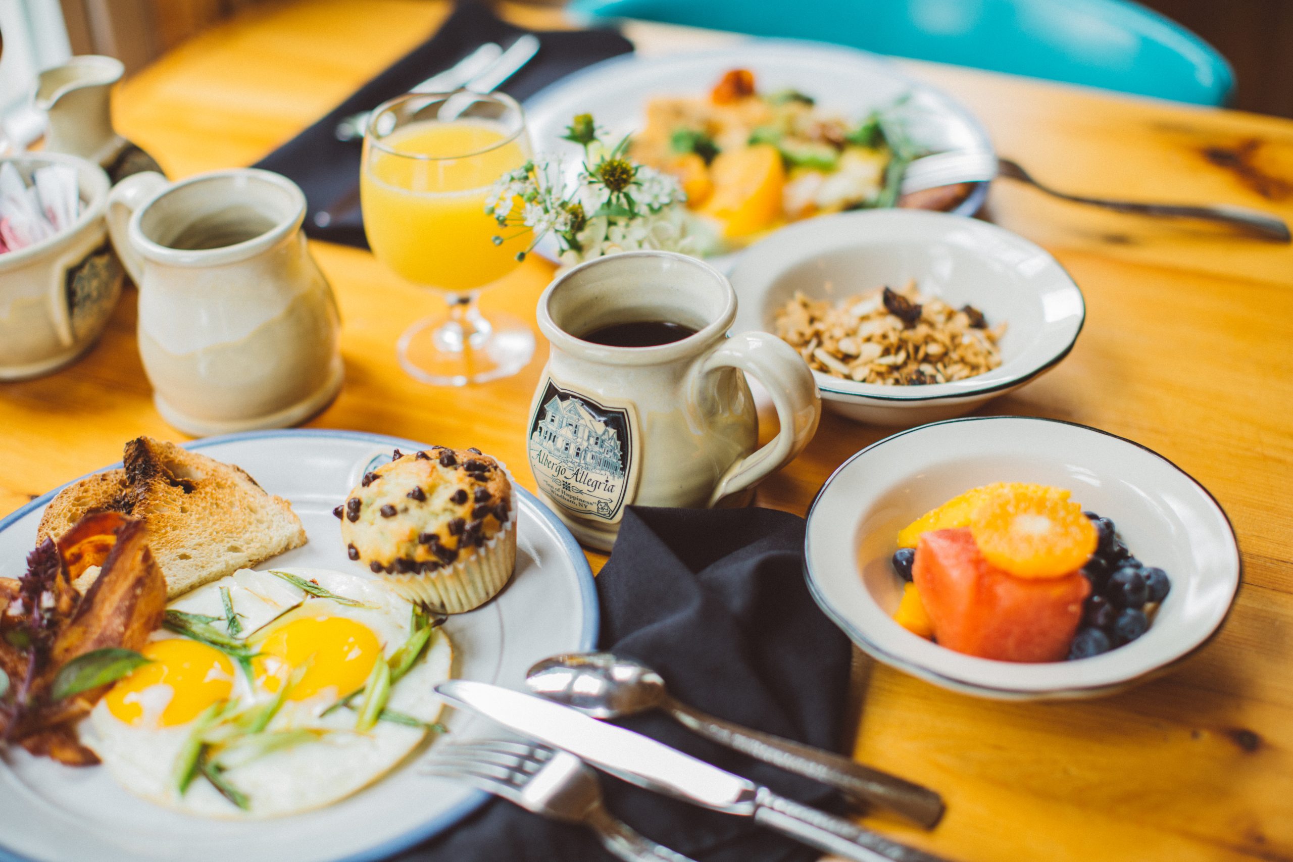 Breakfast-by-Albergo-orange-juice-and-mug-on-table