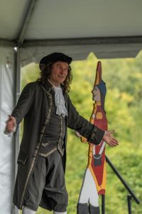 Master Storyteller Jonathan Kruk performs on stage.