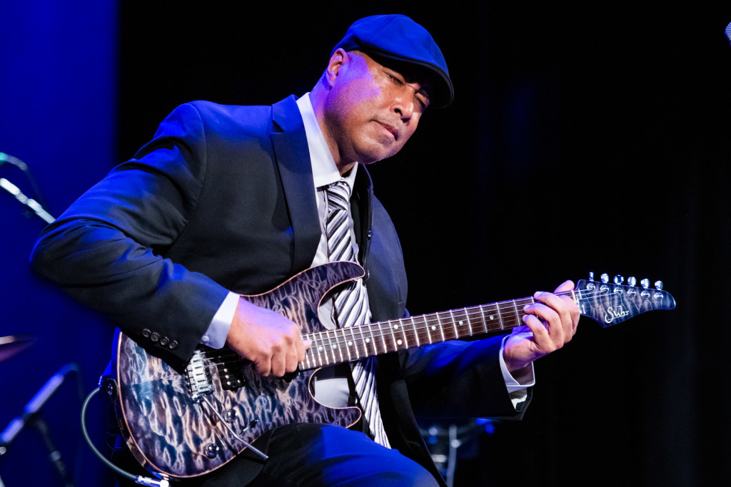 Former New York Yankees great Bernie Williams plays his guitar at Millbrook Vineyards & Winery