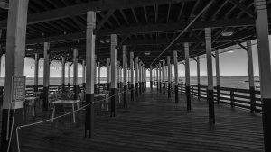 The Playland Pier in the shadows.