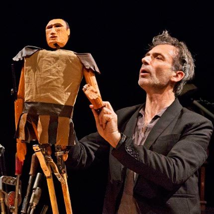 Actor and puppet onstage at Bridge Street Theatre
