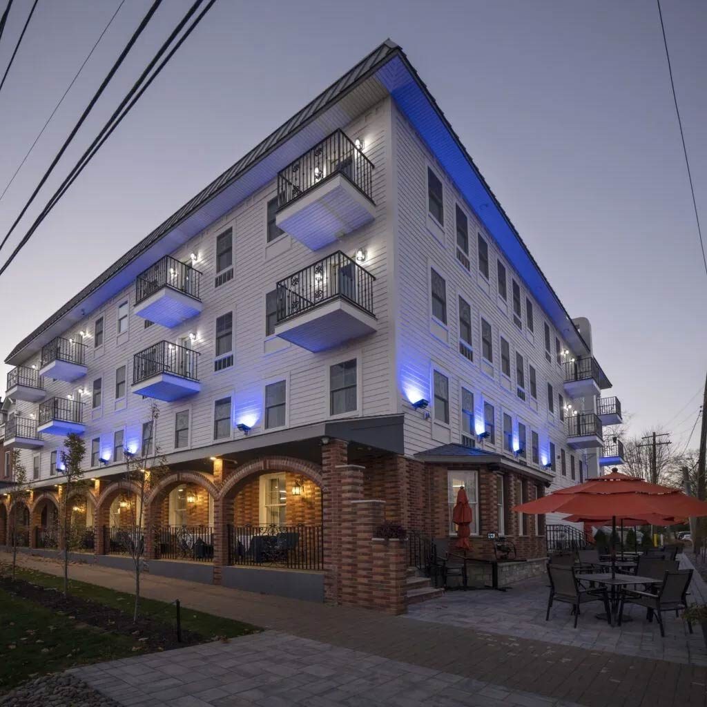 Orange Inn Boutique Hotel exterior at night