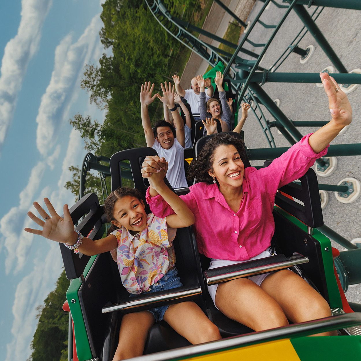 Family having fun riding rollercoaster, Legoland, Goshen, Orange County