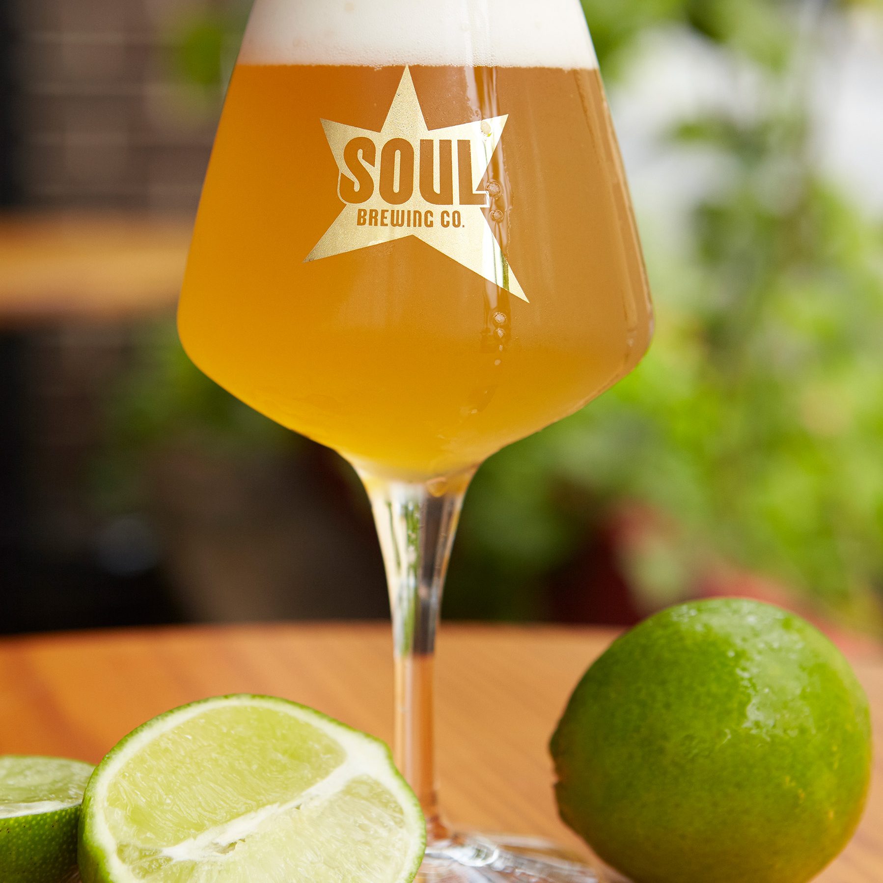 Glass of beer and limes from Soul Brewing Company, Westchester