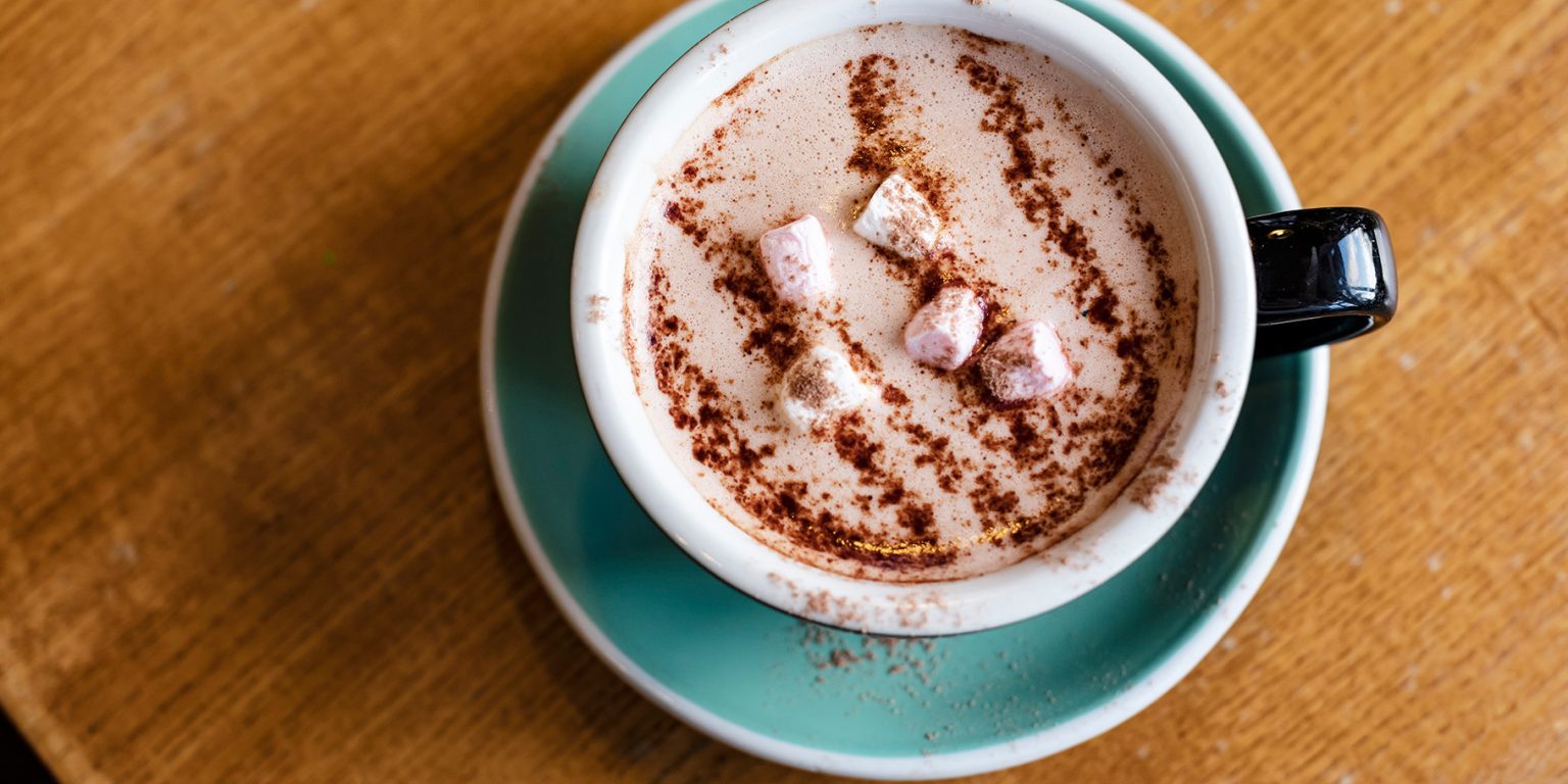 Overhead view of cup of hot chocolate with marshmallows
